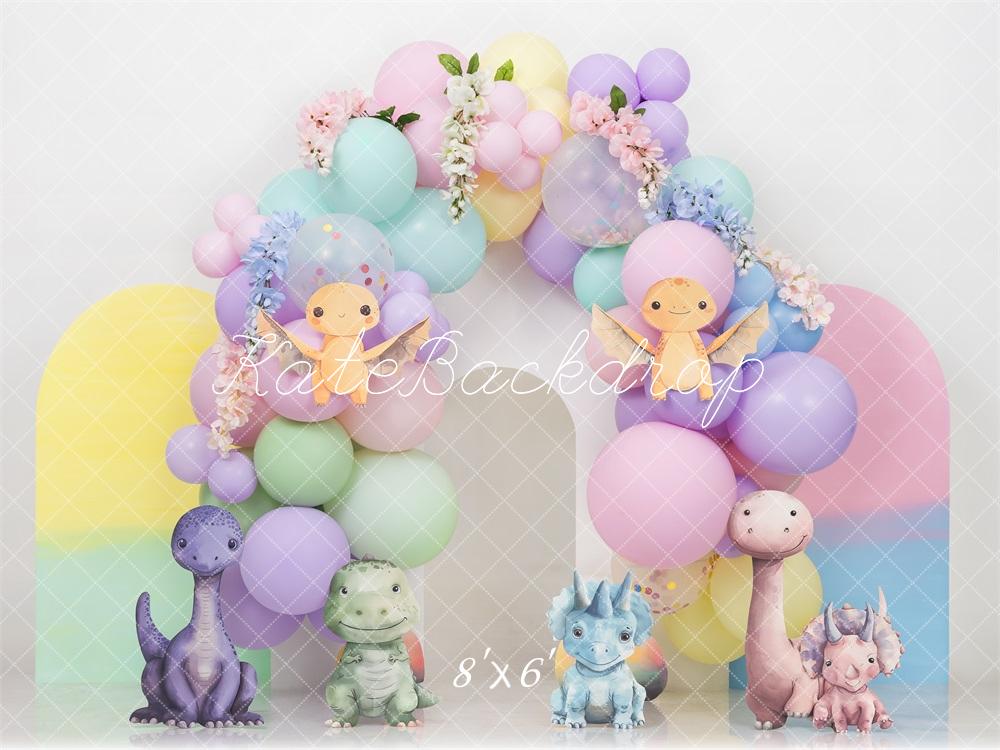 Pastel Dino Smash Cake Fondo Arco Colorido Diseñado por Mini MakeBelieve