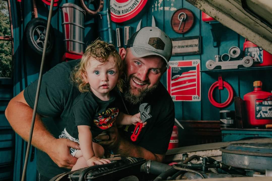 Kate Modern Tool Holder and Tires Red Tanker Garage Backdrop Designed by Emetselch