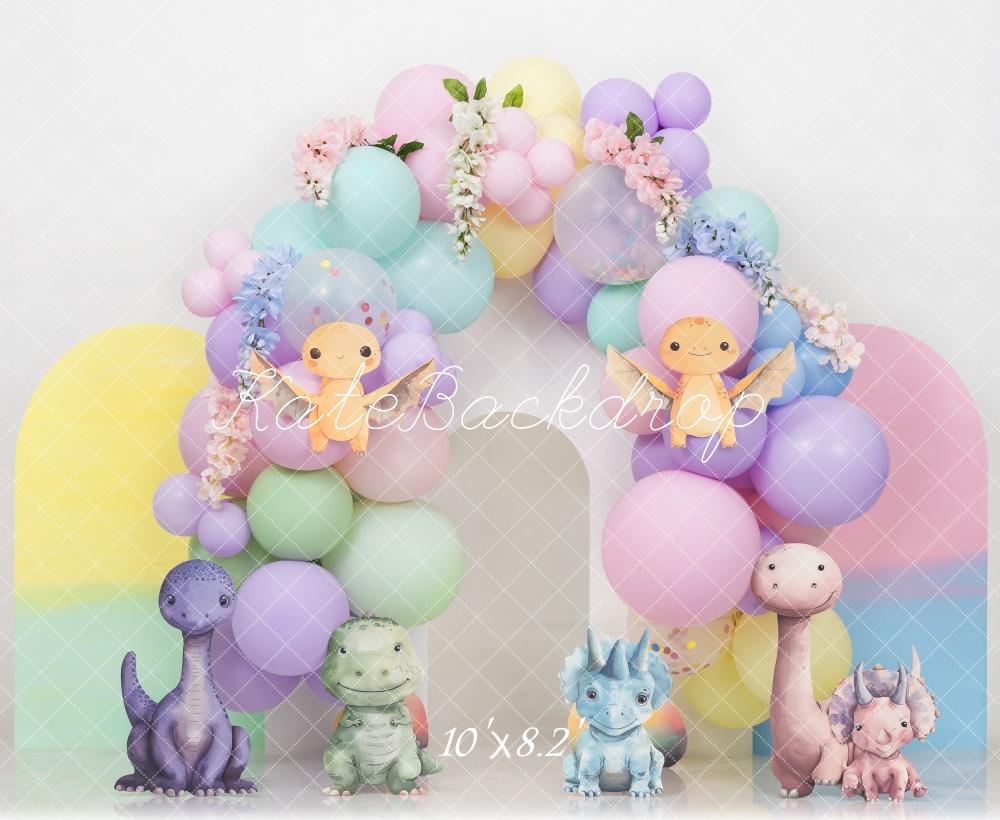 Pastel Dino Smash Cake Fondo Arco Colorido Diseñado por Mini MakeBelieve