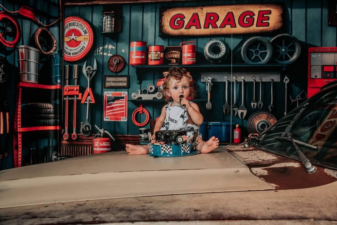 Kate Modern Tool Holder and Tires Red Tanker Garage Backdrop Designed by Emetselch