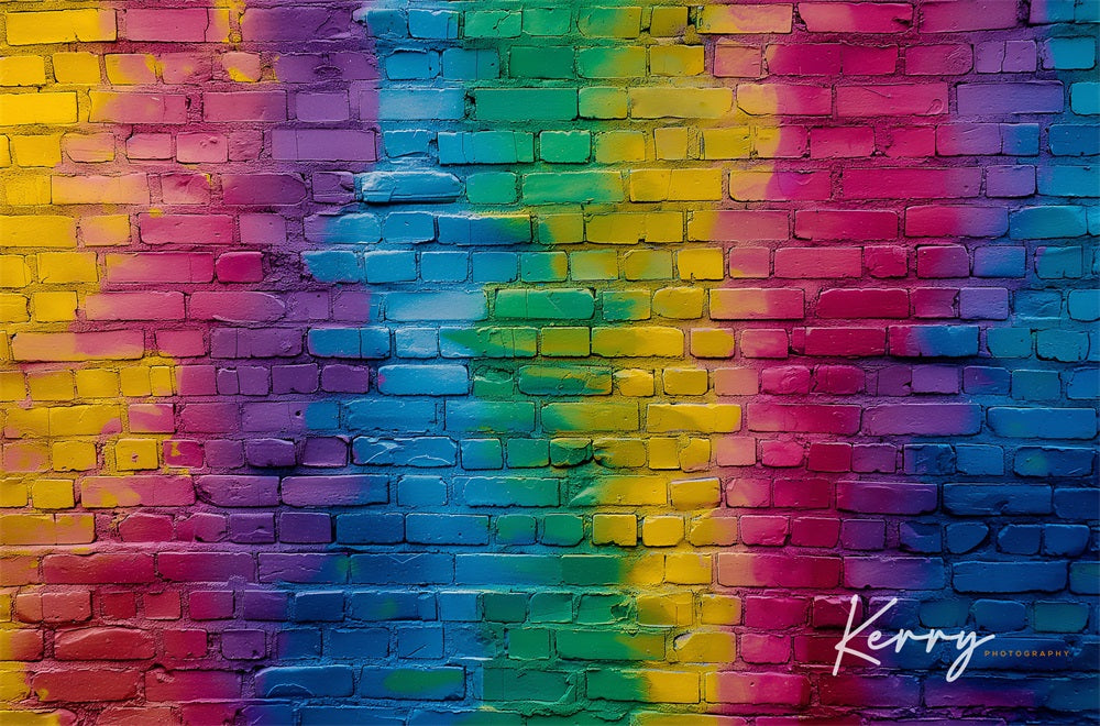 Sfondo di un muro di mattoni arcobaleno pieno di graffiti colorati disegnato da Kerry Anderson