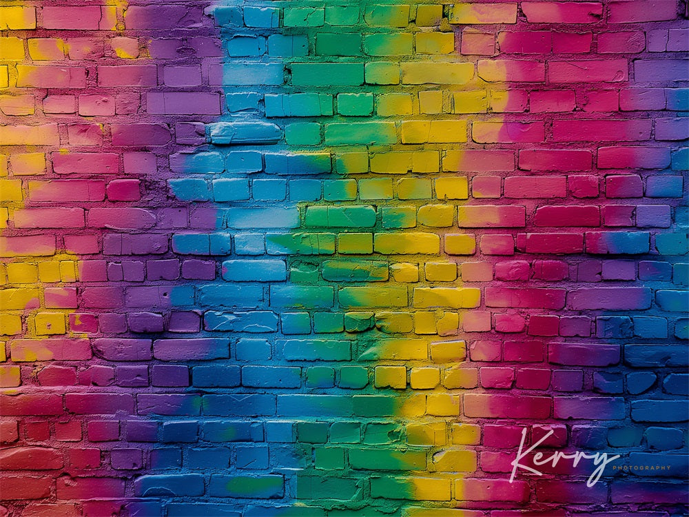 Sfondo di un muro di mattoni arcobaleno pieno di graffiti colorati disegnato da Kerry Anderson