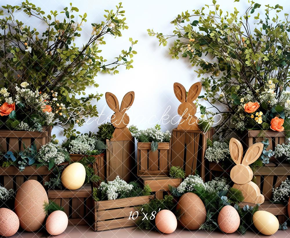 Scenografia pasquale con conigli di legno progettata da Patty Robert