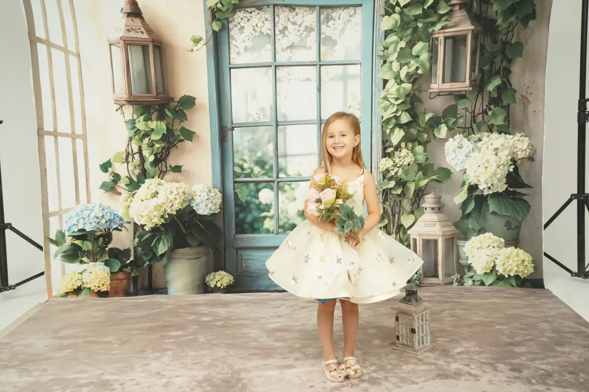 Vestido de niños escalonado en tonos rosados y morados para fotografía