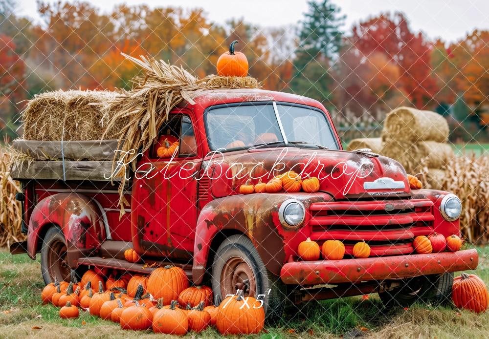 Pickup rustico rosso con sfondo di zucche Designed by Patty Robert